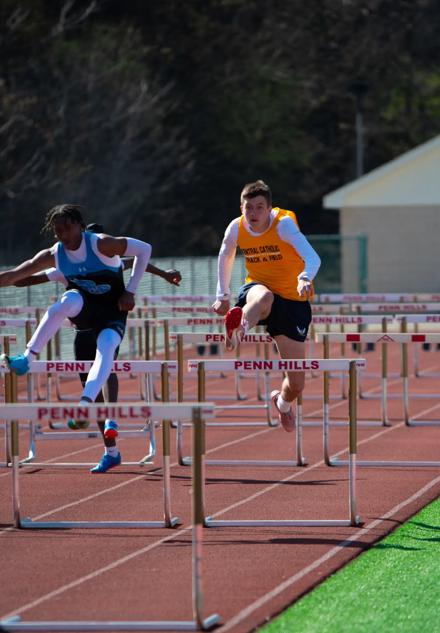 Finnley running hurdles